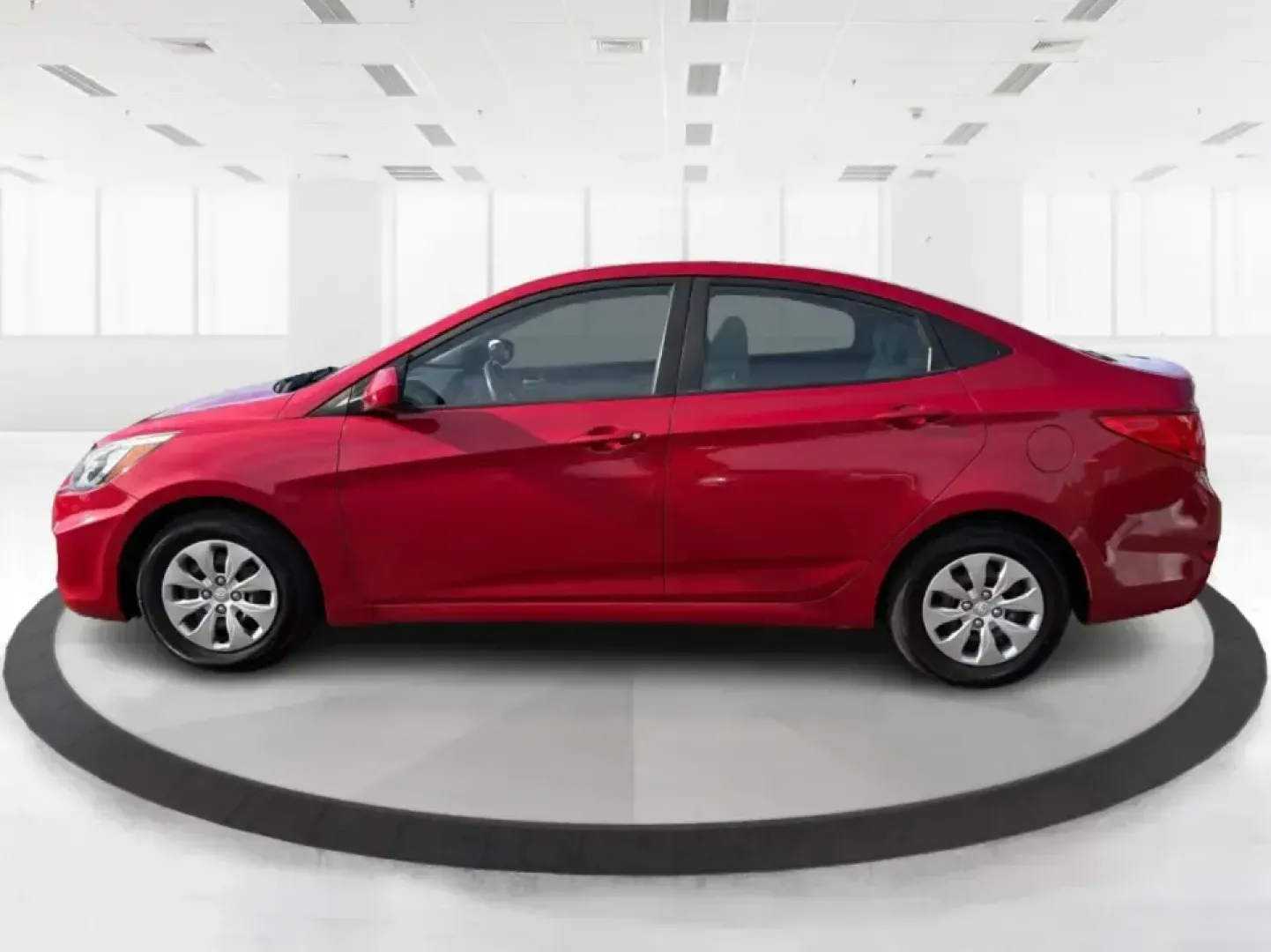 2016 Hyundai Accent SE 4-Door 6A (KMHCT4AE7GU) with an 1.6L L4 DOHC 16V engine, 6A transmission, located at 880 E. National Road, Vandalia, OH, 45377, (937) 908-9800, 39.891918, -84.183594 - Need a smart, budget-friendly commuter that still feels comfortable for everyday life around Vandalia and the Dayton area? This **2016 Hyundai Accent SE** in **Boston Red Metallic** is a practical sedan for busy schedules-perfect for the daily run up **I75**, quick errands along **E. National Road** - Photo#5