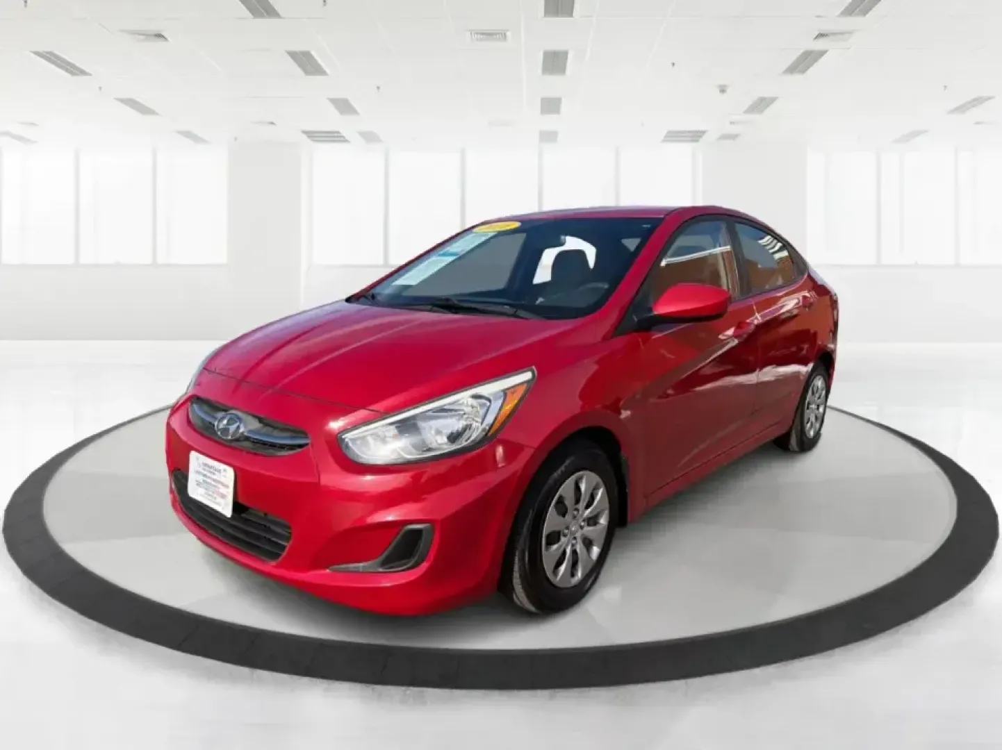 2016 Hyundai Accent SE 4-Door 6A (KMHCT4AE7GU) with an 1.6L L4 DOHC 16V engine, 6A transmission, located at 880 E. National Road, Vandalia, OH, 45377, (937) 908-9800, 39.891918, -84.183594 - Need a smart, budget-friendly commuter that still feels comfortable for everyday life around Vandalia and the Dayton area? This **2016 Hyundai Accent SE** in **Boston Red Metallic** is a practical sedan for busy schedules-perfect for the daily run up **I75**, quick errands along **E. National Road** - Photo#8