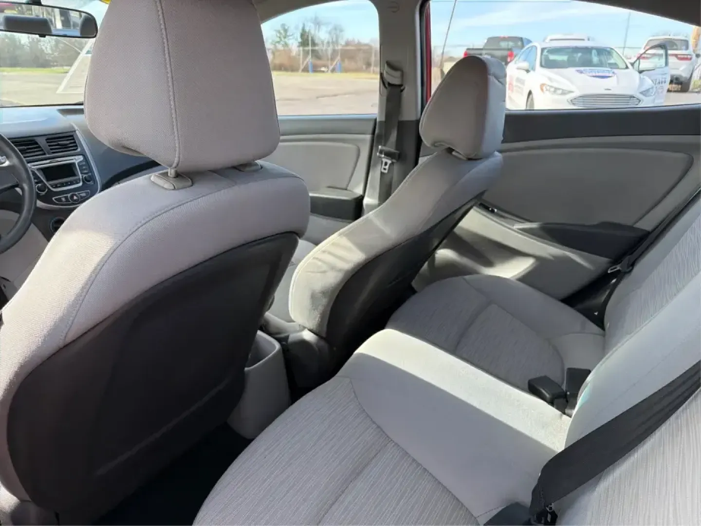 2016 Hyundai Accent SE 4-Door 6A (KMHCT4AE7GU) with an 1.6L L4 DOHC 16V engine, 6A transmission, located at 880 E. National Road, Vandalia, OH, 45377, (937) 908-9800, 39.891918, -84.183594 - Need a smart, budget-friendly commuter that still feels comfortable for everyday life around Vandalia and the Dayton area? This **2016 Hyundai Accent SE** in **Boston Red Metallic** is a practical sedan for busy schedules-perfect for the daily run up **I75**, quick errands along **E. National Road** - Photo#10