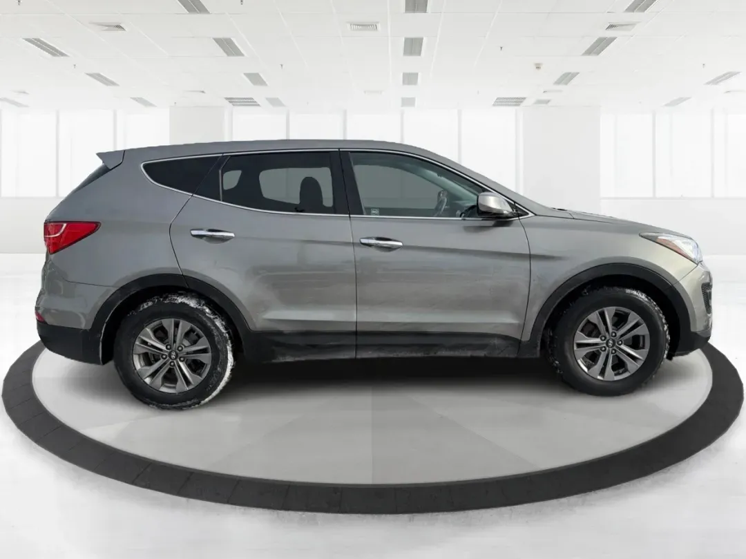 2016 Hyundai Santa Fe 2.4L (5XYZTDLB1GG) with an Theta II 2.4L I-4 gasoline direct injection engine, located at 1099 N County Rd 25A, Troy, OH, 45373, (937) 908-9800, 40.057079, -84.212883 - ### Embrace Your Adventurous Lifestyle with the 2016 Hyundai Santa Fe at Advantage Car and Credit - Troy!<br /> <br /> Are you ready to elevate your weekend escapes or daily commutes? Look no further than this stunning 2016 Hyundai Santa Fe, a versatile SUV designed for those who crave adventure and - Photo#1