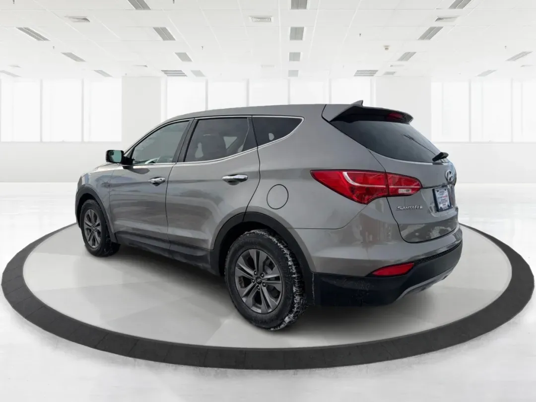 2016 Hyundai Santa Fe 2.4L (5XYZTDLB1GG) with an Theta II 2.4L I-4 gasoline direct injection engine, located at 1099 N County Rd 25A, Troy, OH, 45373, (937) 908-9800, 40.057079, -84.212883 - ### Embrace Your Adventurous Lifestyle with the 2016 Hyundai Santa Fe at Advantage Car and Credit - Troy!<br /> <br /> Are you ready to elevate your weekend escapes or daily commutes? Look no further than this stunning 2016 Hyundai Santa Fe, a versatile SUV designed for those who crave adventure and - Photo#4