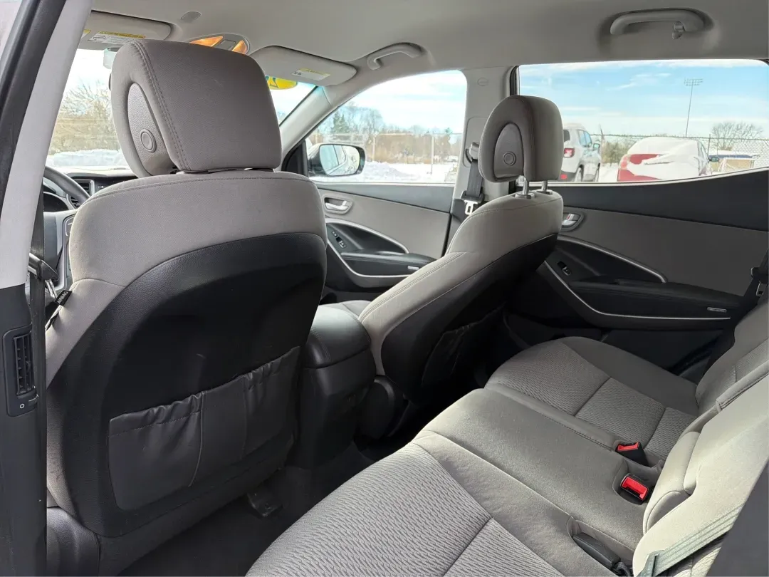 2016 Hyundai Santa Fe 2.4L (5XYZTDLB1GG) with an Theta II 2.4L I-4 gasoline direct injection engine, located at 1099 N County Rd 25A, Troy, OH, 45373, (937) 908-9800, 40.057079, -84.212883 - ### Embrace Your Adventurous Lifestyle with the 2016 Hyundai Santa Fe at Advantage Car and Credit - Troy!<br /> <br /> Are you ready to elevate your weekend escapes or daily commutes? Look no further than this stunning 2016 Hyundai Santa Fe, a versatile SUV designed for those who crave adventure and - Photo#10