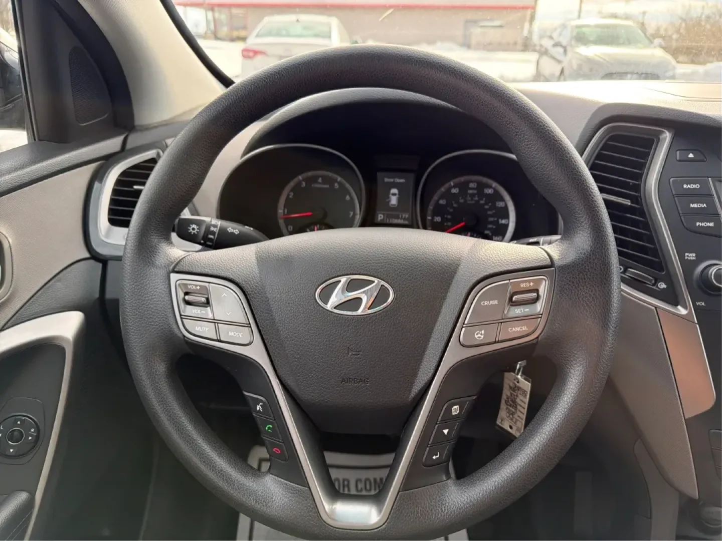 2016 Hyundai Santa Fe 2.4L (5XYZTDLB1GG) with an Theta II 2.4L I-4 gasoline direct injection engine, located at 1099 N County Rd 25A, Troy, OH, 45373, (937) 908-9800, 40.057079, -84.212883 - ### Embrace Your Adventurous Lifestyle with the 2016 Hyundai Santa Fe at Advantage Car and Credit - Troy!<br /> <br /> Are you ready to elevate your weekend escapes or daily commutes? Look no further than this stunning 2016 Hyundai Santa Fe, a versatile SUV designed for those who crave adventure and - Photo#16