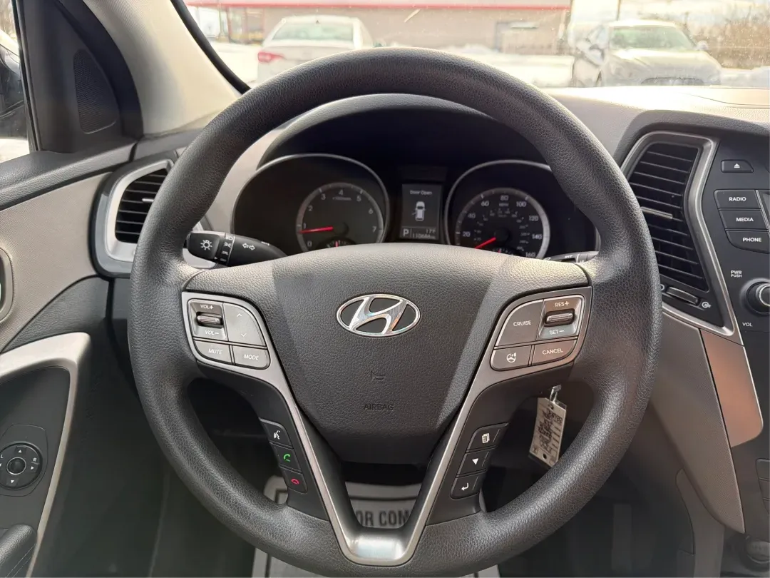 2016 Hyundai Santa Fe 2.4L (5XYZTDLB1GG) with an Theta II 2.4L I-4 gasoline direct injection engine, located at 1099 N County Rd 25A, Troy, OH, 45373, (937) 908-9800, 40.057079, -84.212883 - ### Embrace Your Adventurous Lifestyle with the 2016 Hyundai Santa Fe at Advantage Car and Credit - Troy!<br /> <br /> Are you ready to elevate your weekend escapes or daily commutes? Look no further than this stunning 2016 Hyundai Santa Fe, a versatile SUV designed for those who crave adventure and - Photo#16