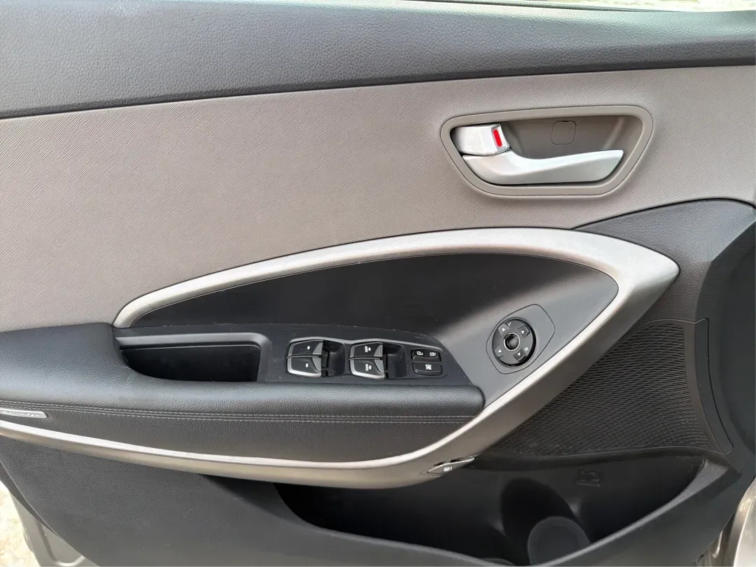 2016 Hyundai Santa Fe 2.4L (5XYZTDLB1GG) with an Theta II 2.4L I-4 gasoline direct injection engine, located at 1099 N County Rd 25A, Troy, OH, 45373, (937) 908-9800, 40.057079, -84.212883 - ### Embrace Your Adventurous Lifestyle with the 2016 Hyundai Santa Fe at Advantage Car and Credit - Troy!<br /> <br /> Are you ready to elevate your weekend escapes or daily commutes? Look no further than this stunning 2016 Hyundai Santa Fe, a versatile SUV designed for those who crave adventure and - Photo#17