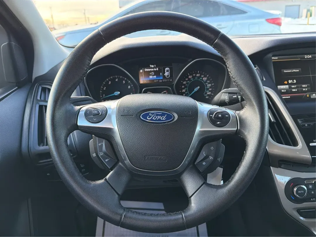 2012 Ford Focus SEL (1FAHP3H28CL) with an 2L I-4 gasoline direct injection engine, located at 8750 N County Rd 25A, Piqua, OH, 45356, (937) 908-9800, 40.164391, -84.232513 - ### Experience Comfort and Convenience with the 2012 Ford Focus SEL at Advantage Car and Credit - Piqua<br /> <br /> Are you searching for a reliable vehicle that perfectly complements your busy lifestyle? Whether you're commuting to work, running errands around Piqua, or planning a family road trip - Photo#16