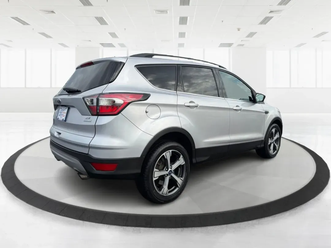 2017 Ford Escape SE (1FMCU0G95HU) with an Other engine, located at 8750 N County Rd 25A, Piqua, OH, 45356, (937) 908-9800, 40.164391, -84.232513 - Are you ready to elevate your lifestyle with a vehicle that perfectly balances comfort, versatility, and affordability? Look no further than the stunning 2017 Ford Escape SE, available now at Advantage Car and Credit - Piqua. This SUV is not just a vehicle; it's your new partner for family outings, - Photo#2