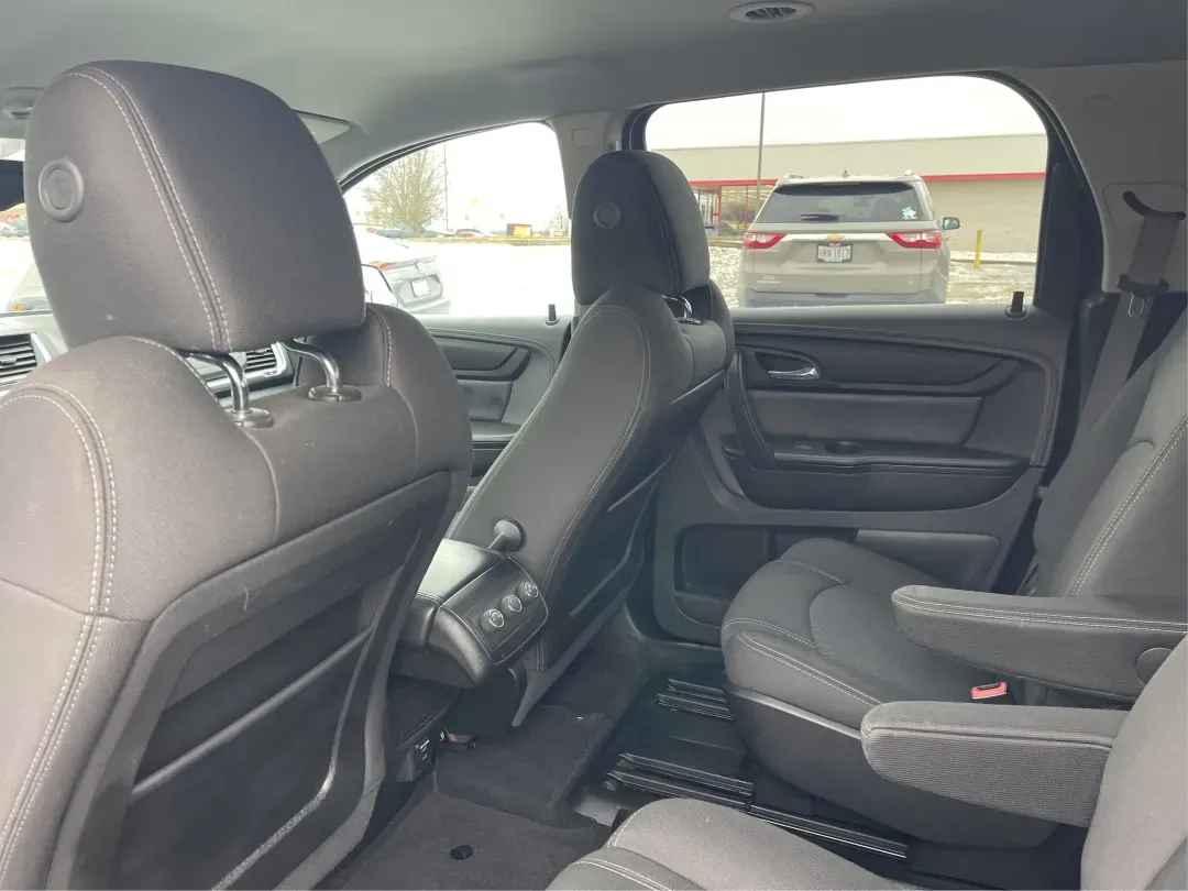 2015 GMC Acadia SLE-2 (1GKKVPKD6FJ) with an 3.6L V-6 gasoline direct injection engine, located at 8750 N County Rd 25A, Piqua, OH, 45356, (937) 908-9800, 40.164391, -84.232513 - Are you ready to elevate your family adventures or conquer your daily commute with unmatched style and comfort? Look no further than this stunning 2015 GMC Acadia SLE-2, available now at Advantage Car and Credit - Piqua. Perfectly designed for growing families, this sport utility vehicle offers a bl - Photo#3