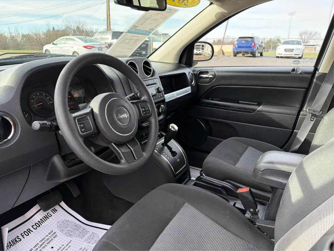 2016 Jeep Compass Sport (1C4NJDBB2GD) with an 2.4L I-4 DOHC engine, located at 1184 Kauffman Ave, Fairborn, OH, 45324, (937) 908-9800, 39.807072, -84.030914 - 2016 Jeep Compass Sport - Photo#9