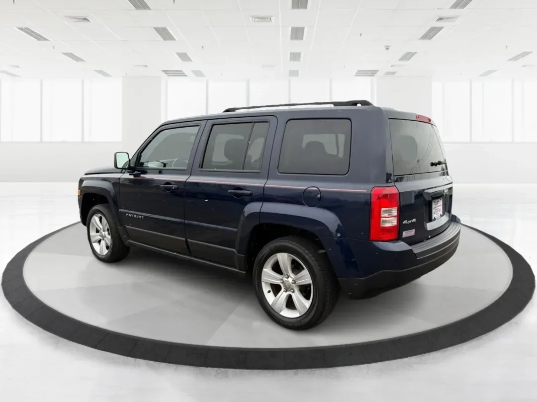 2014 Jeep Patriot Latitude (1C4NJRFB0ED) with an 2.4L I-4 DOHC engine, located at 1099 N County Rd 25A, Troy, OH, 45373, (937) 908-9800, 40.057079, -84.212883 - **Explore the Open Road in Style: 2014 Jeep Patriot Latitude at Advantage Car and Credit - Troy**<br /> <br /> Are you ready for your next adventure? The 2014 Jeep Patriot Latitude is the perfect vehicle for those who crave exploration and flexibility in their daily lives. Whether you're navigating - Photo#4