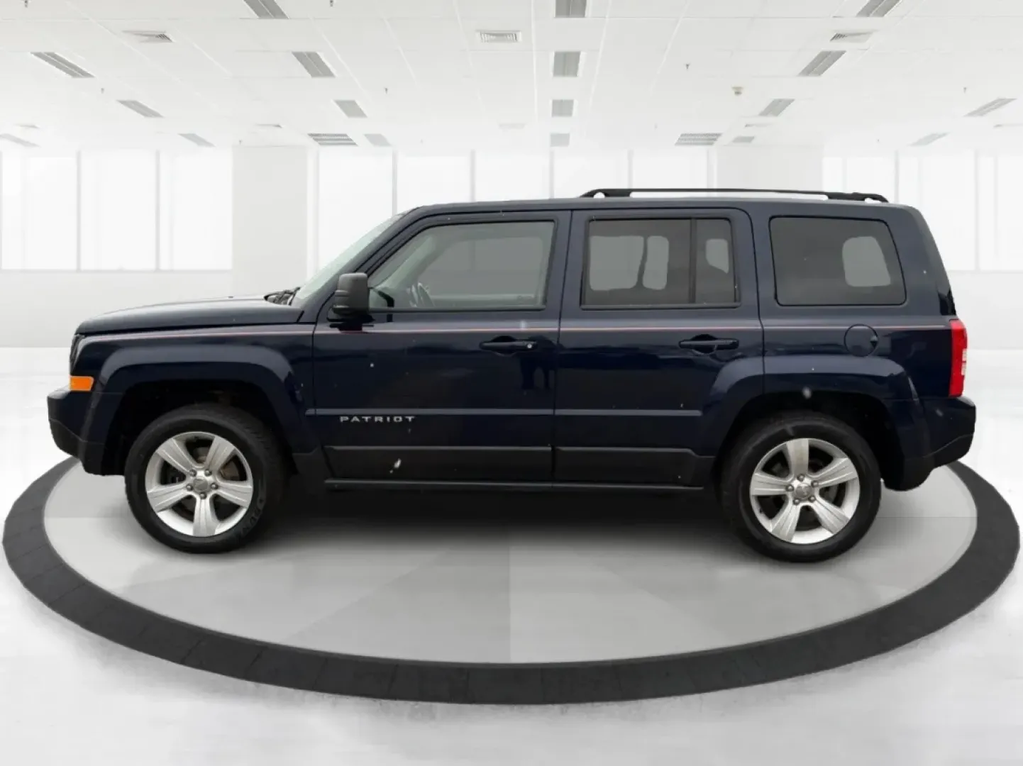 2014 Jeep Patriot Latitude (1C4NJRFB0ED) with an 2.4L I-4 DOHC engine, located at 1099 N County Rd 25A, Troy, OH, 45373, (937) 908-9800, 40.057079, -84.212883 - **Explore the Open Road in Style: 2014 Jeep Patriot Latitude at Advantage Car and Credit - Troy**<br /> <br /> Are you ready for your next adventure? The 2014 Jeep Patriot Latitude is the perfect vehicle for those who crave exploration and flexibility in their daily lives. Whether you're navigating - Photo#5