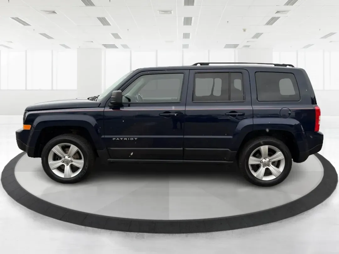 2014 Jeep Patriot Latitude (1C4NJRFB0ED) with an 2.4L I-4 DOHC engine, located at 1099 N County Rd 25A, Troy, OH, 45373, (937) 908-9800, 40.057079, -84.212883 - **Explore the Open Road in Style: 2014 Jeep Patriot Latitude at Advantage Car and Credit - Troy**<br /> <br /> Are you ready for your next adventure? The 2014 Jeep Patriot Latitude is the perfect vehicle for those who crave exploration and flexibility in their daily lives. Whether you're navigating - Photo#5