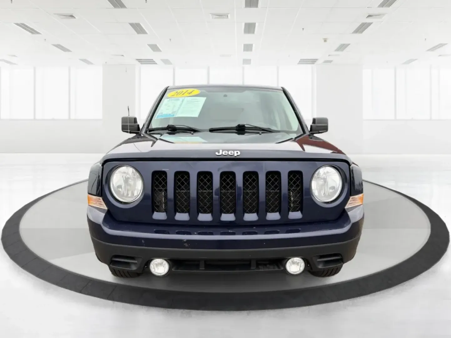 2014 Jeep Patriot Latitude (1C4NJRFB0ED) with an 2.4L I-4 DOHC engine, located at 1099 N County Rd 25A, Troy, OH, 45373, (937) 908-9800, 40.057079, -84.212883 - **Explore the Open Road in Style: 2014 Jeep Patriot Latitude at Advantage Car and Credit - Troy**<br /> <br /> Are you ready for your next adventure? The 2014 Jeep Patriot Latitude is the perfect vehicle for those who crave exploration and flexibility in their daily lives. Whether you're navigating - Photo#7