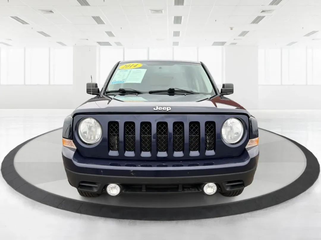 2014 Jeep Patriot Latitude (1C4NJRFB0ED) with an 2.4L I-4 DOHC engine, located at 1099 N County Rd 25A, Troy, OH, 45373, (937) 908-9800, 40.057079, -84.212883 - **Explore the Open Road in Style: 2014 Jeep Patriot Latitude at Advantage Car and Credit - Troy**<br /> <br /> Are you ready for your next adventure? The 2014 Jeep Patriot Latitude is the perfect vehicle for those who crave exploration and flexibility in their daily lives. Whether you're navigating - Photo#7