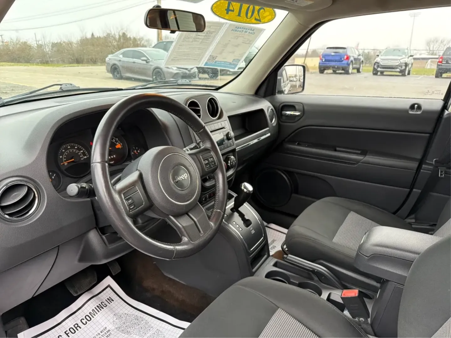 2014 Jeep Patriot Latitude (1C4NJRFB0ED) with an 2.4L I-4 DOHC engine, located at 1099 N County Rd 25A, Troy, OH, 45373, (937) 908-9800, 40.057079, -84.212883 - **Explore the Open Road in Style: 2014 Jeep Patriot Latitude at Advantage Car and Credit - Troy**<br /> <br /> Are you ready for your next adventure? The 2014 Jeep Patriot Latitude is the perfect vehicle for those who crave exploration and flexibility in their daily lives. Whether you're navigating - Photo#9