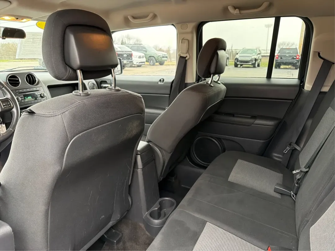 2014 Jeep Patriot Latitude (1C4NJRFB0ED) with an 2.4L I-4 DOHC engine, located at 1099 N County Rd 25A, Troy, OH, 45373, (937) 908-9800, 40.057079, -84.212883 - **Explore the Open Road in Style: 2014 Jeep Patriot Latitude at Advantage Car and Credit - Troy**<br /> <br /> Are you ready for your next adventure? The 2014 Jeep Patriot Latitude is the perfect vehicle for those who crave exploration and flexibility in their daily lives. Whether you're navigating - Photo#10