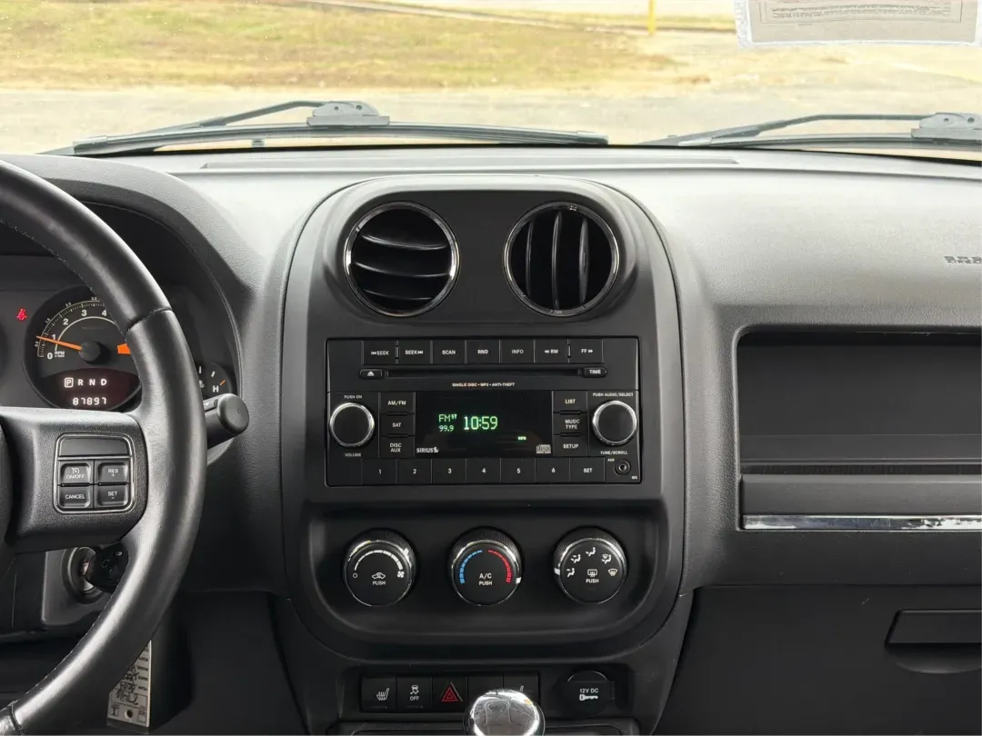 2014 Jeep Patriot Latitude (1C4NJRFB0ED) with an 2.4L I-4 DOHC engine, located at 1099 N County Rd 25A, Troy, OH, 45373, (937) 908-9800, 40.057079, -84.212883 - **Explore the Open Road in Style: 2014 Jeep Patriot Latitude at Advantage Car and Credit - Troy**<br /> <br /> Are you ready for your next adventure? The 2014 Jeep Patriot Latitude is the perfect vehicle for those who crave exploration and flexibility in their daily lives. Whether you're navigating - Photo#13