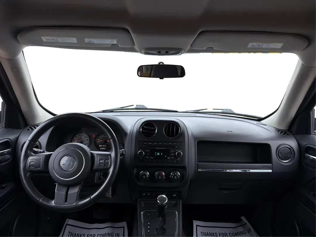 2014 Jeep Patriot Latitude (1C4NJRFB0ED) with an 2.4L I-4 DOHC engine, located at 1099 N County Rd 25A, Troy, OH, 45373, (937) 908-9800, 40.057079, -84.212883 - **Explore the Open Road in Style: 2014 Jeep Patriot Latitude at Advantage Car and Credit - Troy**<br /> <br /> Are you ready for your next adventure? The 2014 Jeep Patriot Latitude is the perfect vehicle for those who crave exploration and flexibility in their daily lives. Whether you're navigating - Photo#19