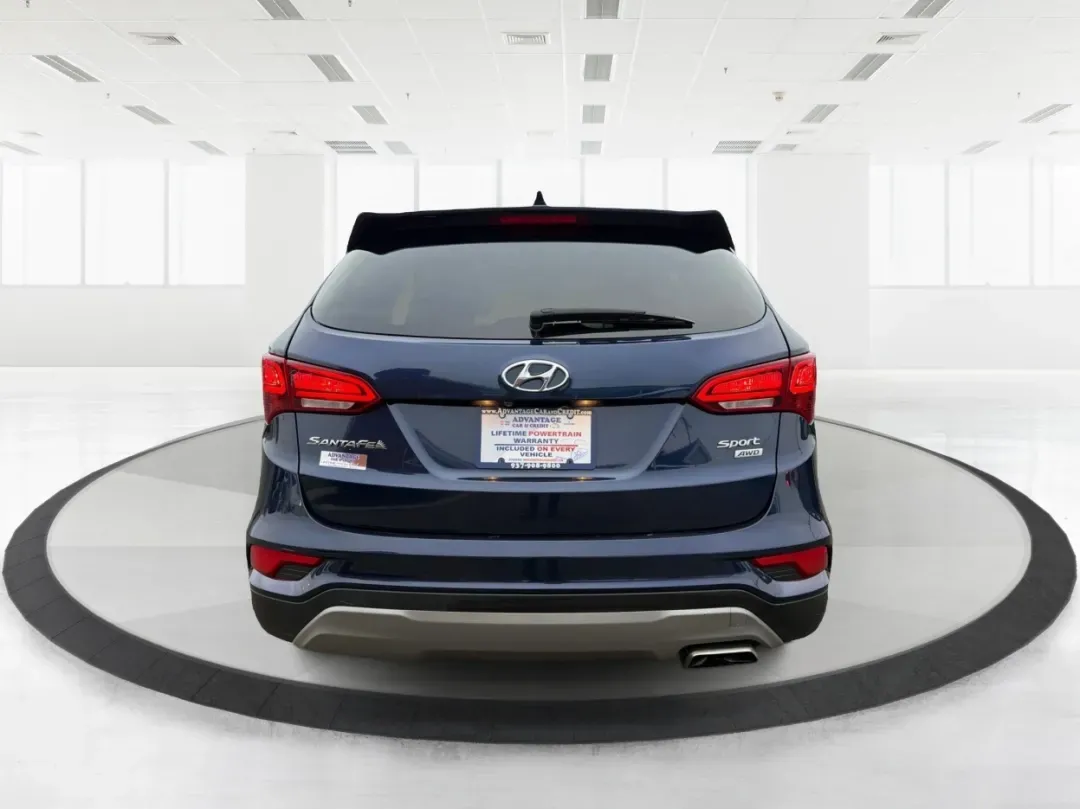 2017 Hyundai Santa Fe 2.4L (5XYZTDLB6HG) with an Theta II 2.4L I-4 gasoline direct injection engine, located at 1099 N County Rd 25A, Troy, OH, 45373, (937) 908-9800, 40.057079, -84.212883 - **Experience Adventure and Comfort with the 2017 Hyundai Santa Fe at Advantage Car and Credit - Troy!**<br /> <br /> Are you searching for the perfect vehicle that accommodates your active lifestyle? Look no further! The 2017 Hyundai Santa Fe is the ideal SUV for families on the go, weekend adventur - Photo#3