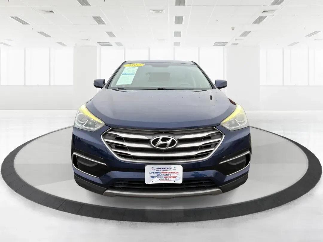 2017 Hyundai Santa Fe 2.4L (5XYZTDLB6HG) with an Theta II 2.4L I-4 gasoline direct injection engine, located at 1099 N County Rd 25A, Troy, OH, 45373, (937) 908-9800, 40.057079, -84.212883 - **Experience Adventure and Comfort with the 2017 Hyundai Santa Fe at Advantage Car and Credit - Troy!**<br /> <br /> Are you searching for the perfect vehicle that accommodates your active lifestyle? Look no further! The 2017 Hyundai Santa Fe is the ideal SUV for families on the go, weekend adventur - Photo#7