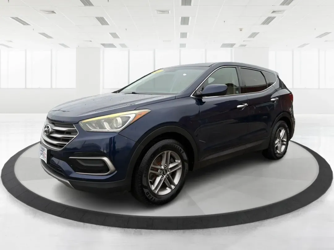 2017 Hyundai Santa Fe 2.4L (5XYZTDLB6HG) with an Theta II 2.4L I-4 gasoline direct injection engine, located at 1099 N County Rd 25A, Troy, OH, 45373, (937) 908-9800, 40.057079, -84.212883 - **Experience Adventure and Comfort with the 2017 Hyundai Santa Fe at Advantage Car and Credit - Troy!**<br /> <br /> Are you searching for the perfect vehicle that accommodates your active lifestyle? Look no further! The 2017 Hyundai Santa Fe is the ideal SUV for families on the go, weekend adventur - Photo#8