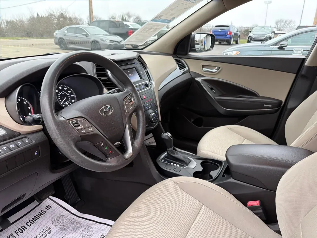 2017 Hyundai Santa Fe 2.4L (5XYZTDLB6HG) with an Theta II 2.4L I-4 gasoline direct injection engine, located at 1099 N County Rd 25A, Troy, OH, 45373, (937) 908-9800, 40.057079, -84.212883 - **Experience Adventure and Comfort with the 2017 Hyundai Santa Fe at Advantage Car and Credit - Troy!**<br /> <br /> Are you searching for the perfect vehicle that accommodates your active lifestyle? Look no further! The 2017 Hyundai Santa Fe is the ideal SUV for families on the go, weekend adventur - Photo#9