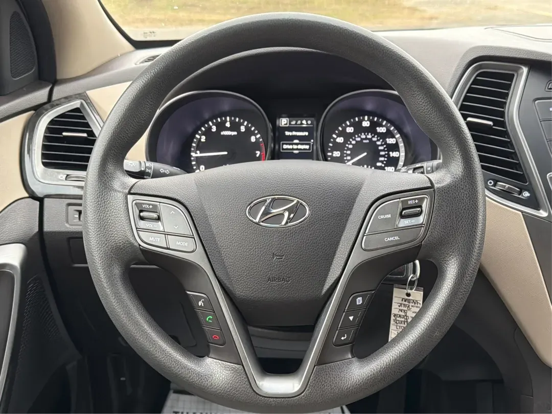 2017 Hyundai Santa Fe 2.4L (5XYZTDLB6HG) with an Theta II 2.4L I-4 gasoline direct injection engine, located at 1099 N County Rd 25A, Troy, OH, 45373, (937) 908-9800, 40.057079, -84.212883 - **Experience Adventure and Comfort with the 2017 Hyundai Santa Fe at Advantage Car and Credit - Troy!**<br /> <br /> Are you searching for the perfect vehicle that accommodates your active lifestyle? Look no further! The 2017 Hyundai Santa Fe is the ideal SUV for families on the go, weekend adventur - Photo#16