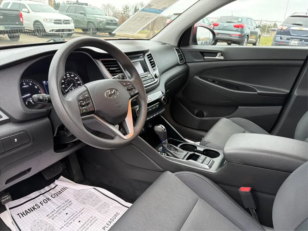 2018 Hyundai Tucson SE (KM8J23A42JU) with an Nu 2L I-4 gasoline direct injection engine, located at 8750 N County Rd 25A, Piqua, OH, 45356, (937) 908-9800, 40.164391, -84.232513 - **Explore the Open Road with the 2018 Hyundai Tucson at Advantage Car and Credit Piqua, OH**<br /> <br /> Are you ready to elevate your driving experience? Whether you're a growing family in need of extra space, a daily commuter looking for efficiency, or an adventure seeker craving weekend road tr - Photo#9