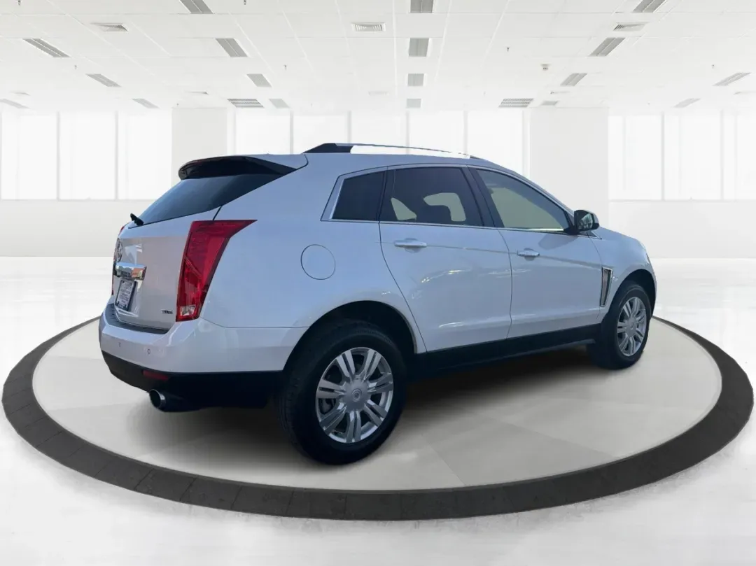 2016 Cadillac SRX Luxury Collection (3GYFNBE37GS) with an 3.6L V-6 gasoline direct injection engine, located at 8750 N County Rd 25A, Piqua, OH, 45356, (937) 908-9800, 40.164391, -84.232513 - **Elevate Your Journey: Own the 2016 Cadillac SRX Luxury Collection SUV Today!**<br /> <br /> Are you in search of a sophisticated vehicle that embraces both practicality and luxury? Look no further than this stunning 2016 Cadillac SRX Luxury Collection SUV, available now at Advantage Car and Credit - Photo#2