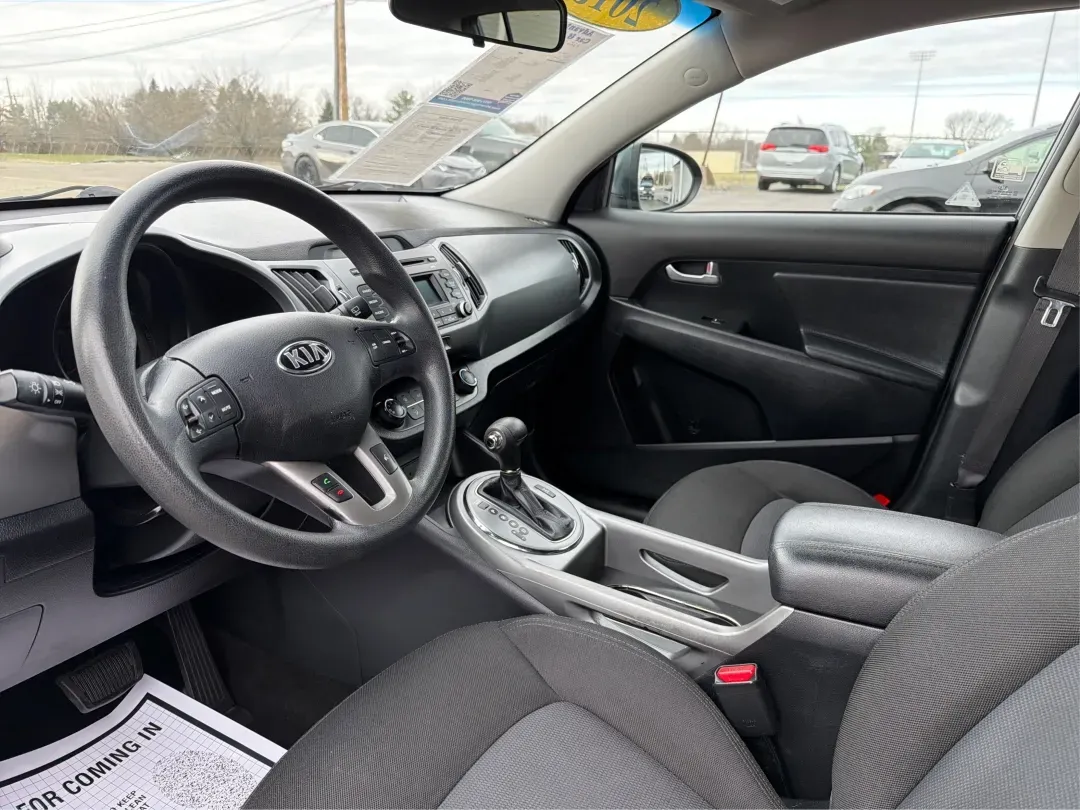 2015 Kia Sportage LX (KNDPBCAC6F7) with an Other engine, located at 4508 South Dixie Dr, Moraine, OH, 45439, (937) 908-9800, 39.689976, -84.218452 - **Unleash Your Adventurous Spirit with the 2015 Kia Sportage LX in Moraine, OH!**<br /> <br /> Are you ready to elevate your lifestyle with a vehicle that perfectly marries practicality and style? The 2015 Kia Sportage LX is your ticket to unforgettable weekend adventures, family outings, and daily - Photo#9