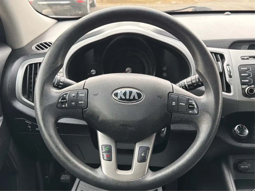 2015 Kia Sportage LX (KNDPBCAC6F7) with an Other engine, located at 4508 South Dixie Dr, Moraine, OH, 45439, (937) 908-9800, 39.689976, -84.218452 - **Unleash Your Adventurous Spirit with the 2015 Kia Sportage LX in Moraine, OH!**<br /> <br /> Are you ready to elevate your lifestyle with a vehicle that perfectly marries practicality and style? The 2015 Kia Sportage LX is your ticket to unforgettable weekend adventures, family outings, and daily - Photo#16