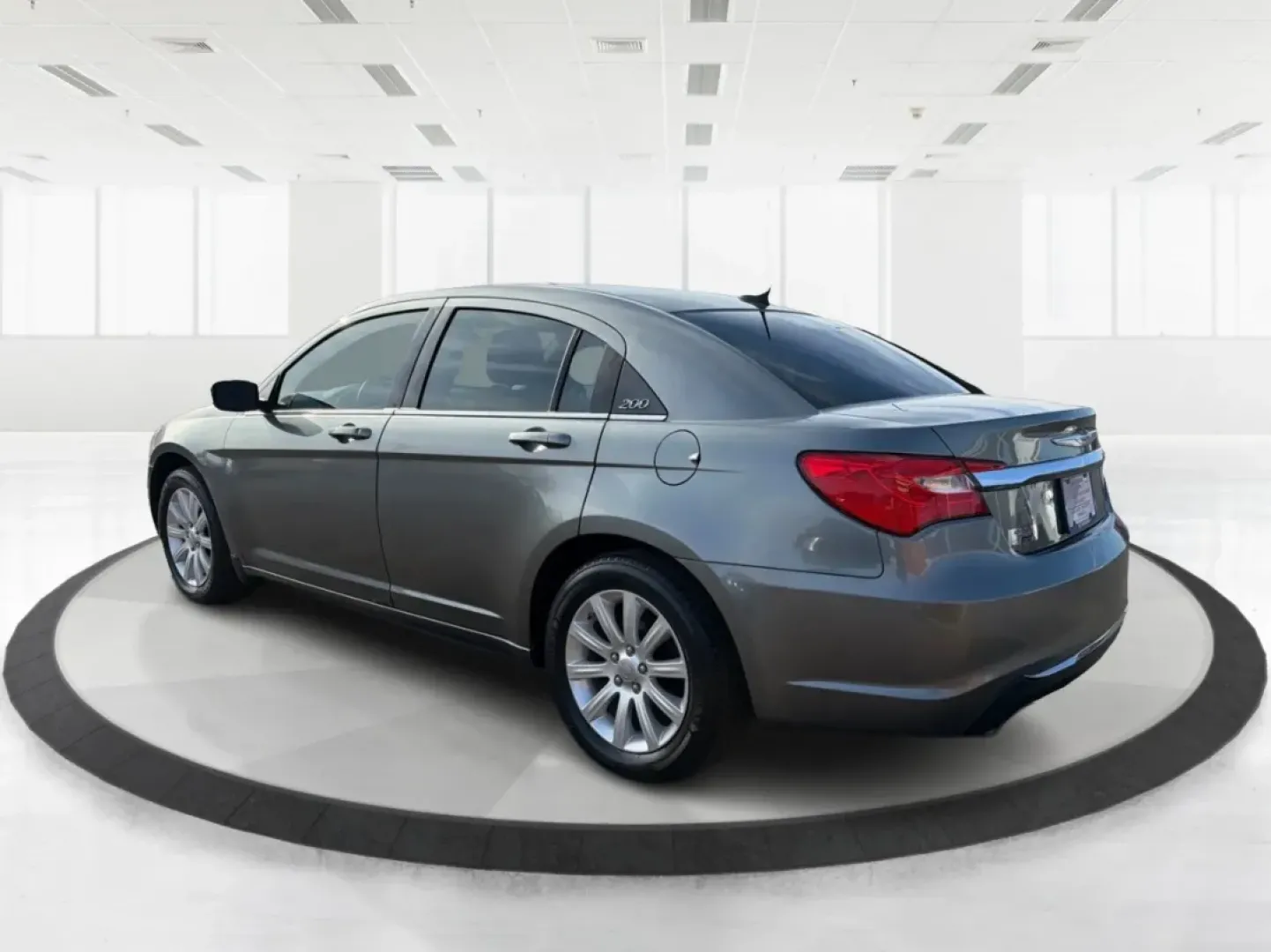2012 Chrysler 200 Touring (1C3CCBBG2CN) with an 3.6L V6 DOHC 24V FFV engine, 6-Speed Automatic transmission, located at 880 E. National Road, Vandalia, OH, 45377, (937) 908-9800, 39.891918, -84.183594 - Discover the perfect blend of style, comfort, and affordability with the 2012 Chrysler 200 Touring sedan, available now at Advantage Car and Credit in Vandalia, OH. This vehicle is ideal for budget-conscious buyers seeking a reliable ride for daily commutes or weekend adventures. With its sleek Tung - Photo#4