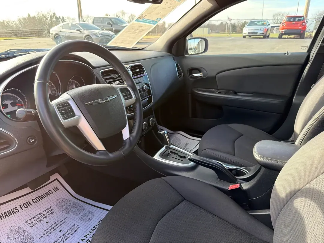 2012 Chrysler 200 Touring (1C3CCBBG2CN) with an Other engine, located at 880 E. National Road, Vandalia, OH, 45377, (937) 908-9800, 39.891918, -84.183594 - Discover the perfect blend of style, comfort, and affordability with the 2012 Chrysler 200 Touring sedan, available now at Advantage Car and Credit in Vandalia, OH. This vehicle is ideal for budget-conscious buyers seeking a reliable ride for daily commutes or weekend adventures. With its sleek Tung - Photo#9