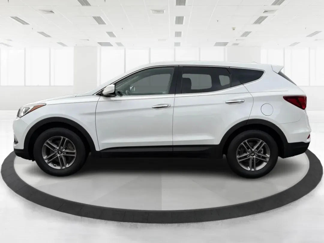 2017 Hyundai Santa Fe 2.4L (5NMZTDLB2HH) with an Theta II 2.4L I-4 gasoline direct injection engine, located at 1951 S Dayton Lakeview Rd., New Carlisle, OH, 45344, (937) 908-9800, 39.890999, -84.050255 - **Elevate Your Family Adventures with the 2017 Hyundai Santa Fe at Advantage Car and Credit!**<br /> <br /> Are you searching for the perfect vehicle to accommodate your growing family or to enhance your weekend getaways? Look no further! The 2017 Hyundai Santa Fe is a versatile and spacious SUV des - Photo#5