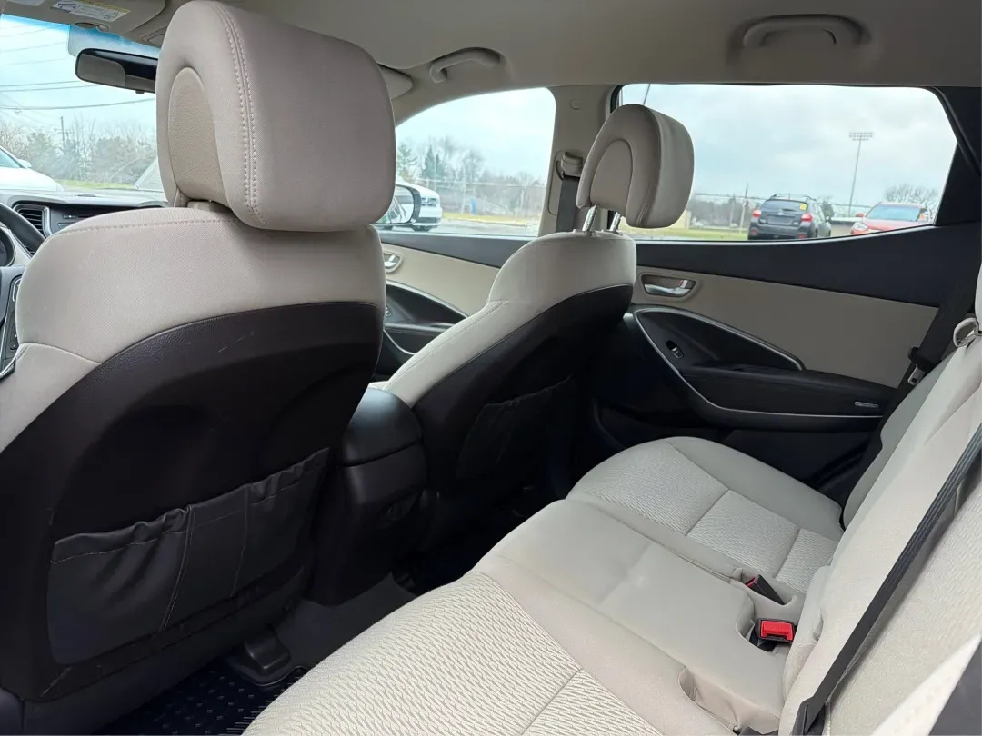 2017 Hyundai Santa Fe 2.4L (5NMZTDLB2HH) with an Theta II 2.4L I-4 gasoline direct injection engine, located at 1951 S Dayton Lakeview Rd., New Carlisle, OH, 45344, (937) 908-9800, 39.890999, -84.050255 - **Elevate Your Family Adventures with the 2017 Hyundai Santa Fe at Advantage Car and Credit!**<br /> <br /> Are you searching for the perfect vehicle to accommodate your growing family or to enhance your weekend getaways? Look no further! The 2017 Hyundai Santa Fe is a versatile and spacious SUV des - Photo#10