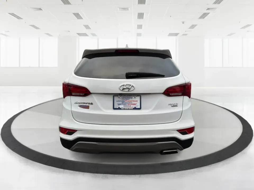 2017 Hyundai Santa Fe 2.4L (5NMZTDLB2HH) with an Theta II 2.4L I-4 gasoline direct injection engine, 6A transmission, located at 1951 S Dayton Lakeview Rd., New Carlisle, OH, 45344, (937) 908-9800, 39.890999, -84.050255 - **Elevate Your Family Adventures with the 2017 Hyundai Santa Fe at Advantage Car and Credit!**<br /> <br /> Are you searching for the perfect vehicle to accommodate your growing family or to enhance your weekend getaways? Look no further! The 2017 Hyundai Santa Fe is a versatile and spacious SUV des - Photo#3