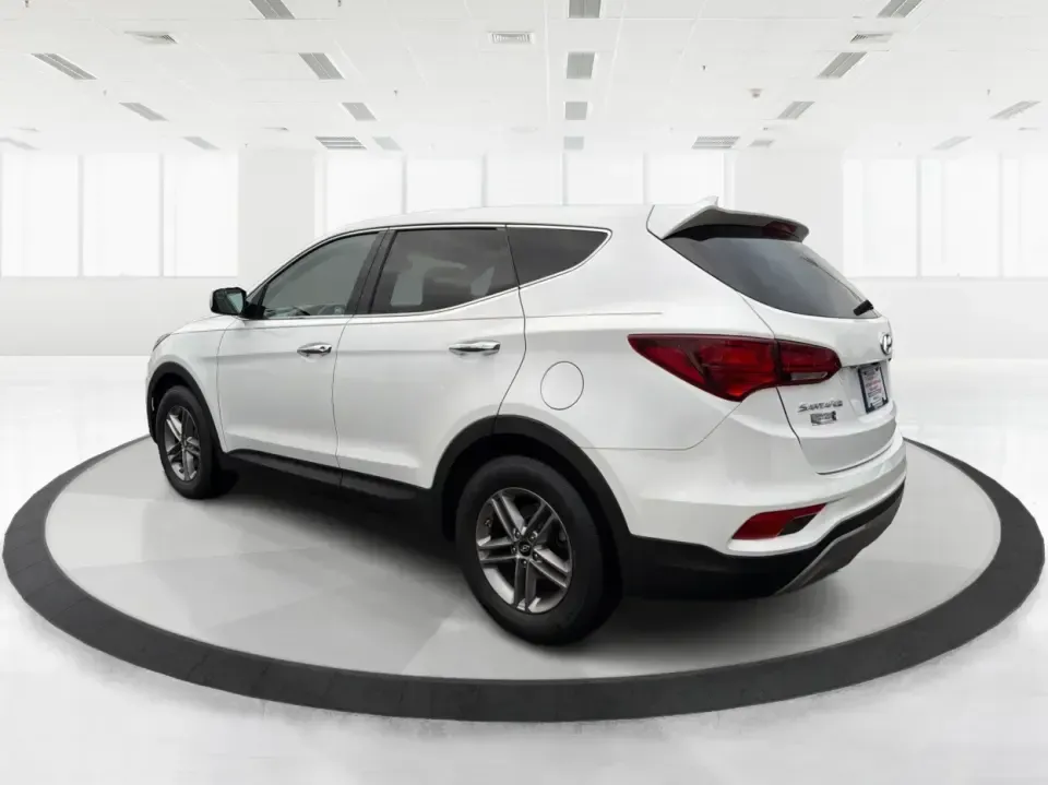 2017 Hyundai Santa Fe 2.4L (5NMZTDLB2HH) with an Theta II 2.4L I-4 gasoline direct injection engine, 6A transmission, located at 1951 S Dayton Lakeview Rd., New Carlisle, OH, 45344, (937) 908-9800, 39.890999, -84.050255 - **Elevate Your Family Adventures with the 2017 Hyundai Santa Fe at Advantage Car and Credit!**<br /> <br /> Are you searching for the perfect vehicle to accommodate your growing family or to enhance your weekend getaways? Look no further! The 2017 Hyundai Santa Fe is a versatile and spacious SUV des - Photo#4