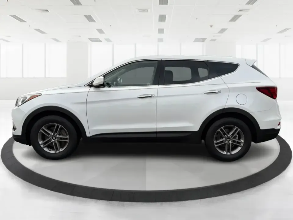 2017 Hyundai Santa Fe 2.4L (5NMZTDLB2HH) with an Theta II 2.4L I-4 gasoline direct injection engine, 6A transmission, located at 1951 S Dayton Lakeview Rd., New Carlisle, OH, 45344, (937) 908-9800, 39.890999, -84.050255 - **Elevate Your Family Adventures with the 2017 Hyundai Santa Fe at Advantage Car and Credit!**<br /> <br /> Are you searching for the perfect vehicle to accommodate your growing family or to enhance your weekend getaways? Look no further! The 2017 Hyundai Santa Fe is a versatile and spacious SUV des - Photo#5