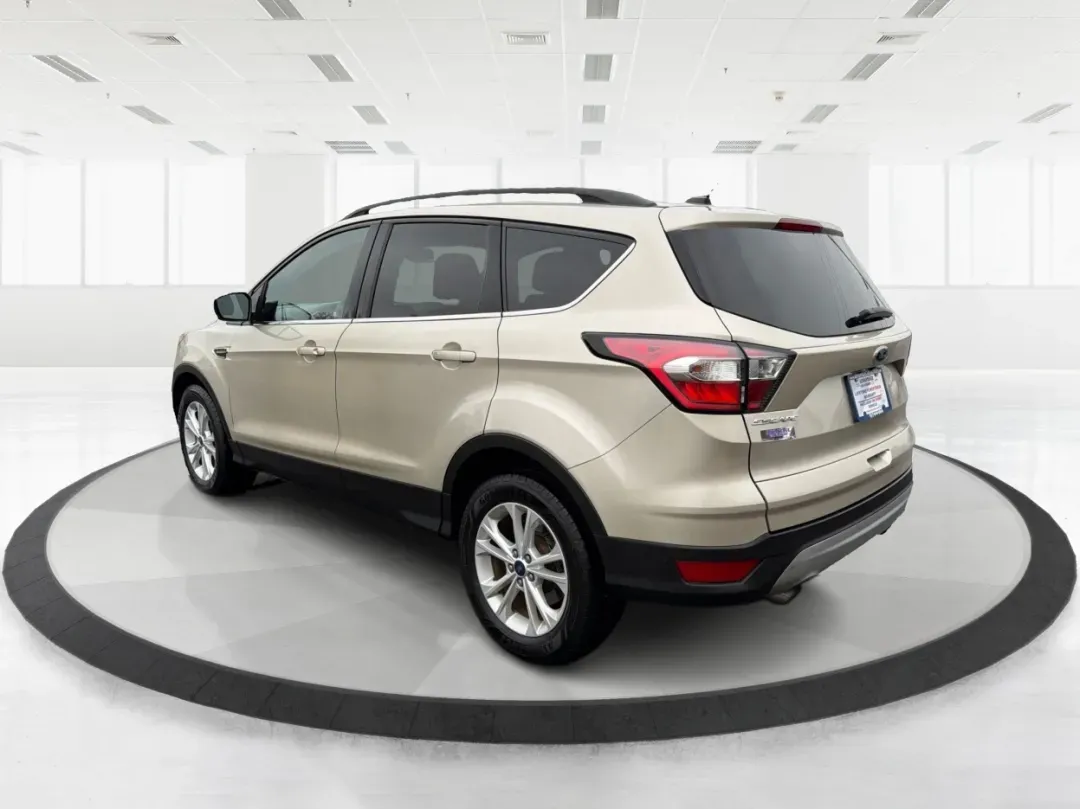 2017 Ford Escape SE (1FMCU0GD1HU) with an Other engine, located at 4508 South Dixie Dr, Moraine, OH, 45439, (937) 908-9800, 39.689976, -84.218452 - Are you ready to elevate your driving experience? Whether you're navigating daily commutes, embarking on weekend getaways, or simply enjoying family outings, the 2017 Ford Escape SE is the perfect companion for your active lifestyle. This well-appointed SUV promises versatility and comfort, making i - Photo#4