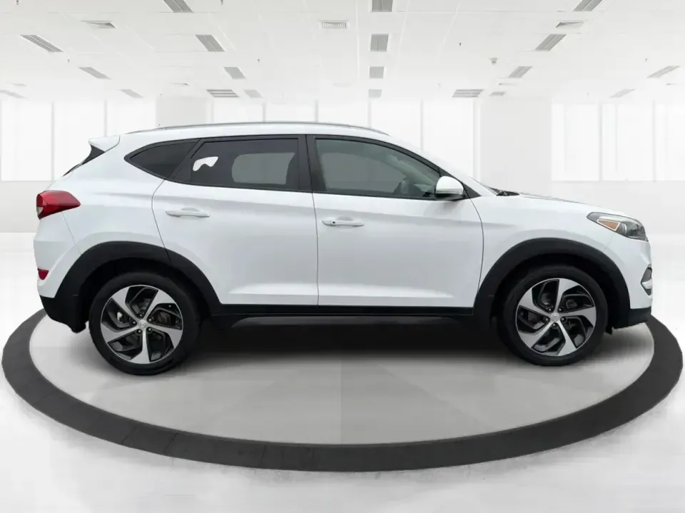 2016 Hyundai Tucson Sport (KM8J3CA26GU) with an 1.6L I-4 gasoline direct injection engine, 7A transmission, located at 1184 Kauffman Ave, Fairborn, OH, 45324, (937) 908-9800, 39.807072, -84.030914 - Discover a world of adventure with the 2016 Hyundai Tucson Sport, the perfect SUV for active families and weekend explorers alike! With its stylish Dazzling White exterior and spacious interior, this vehicle is designed for those who crave both comfort and versatility. Whether you're navigating thro - Photo#1