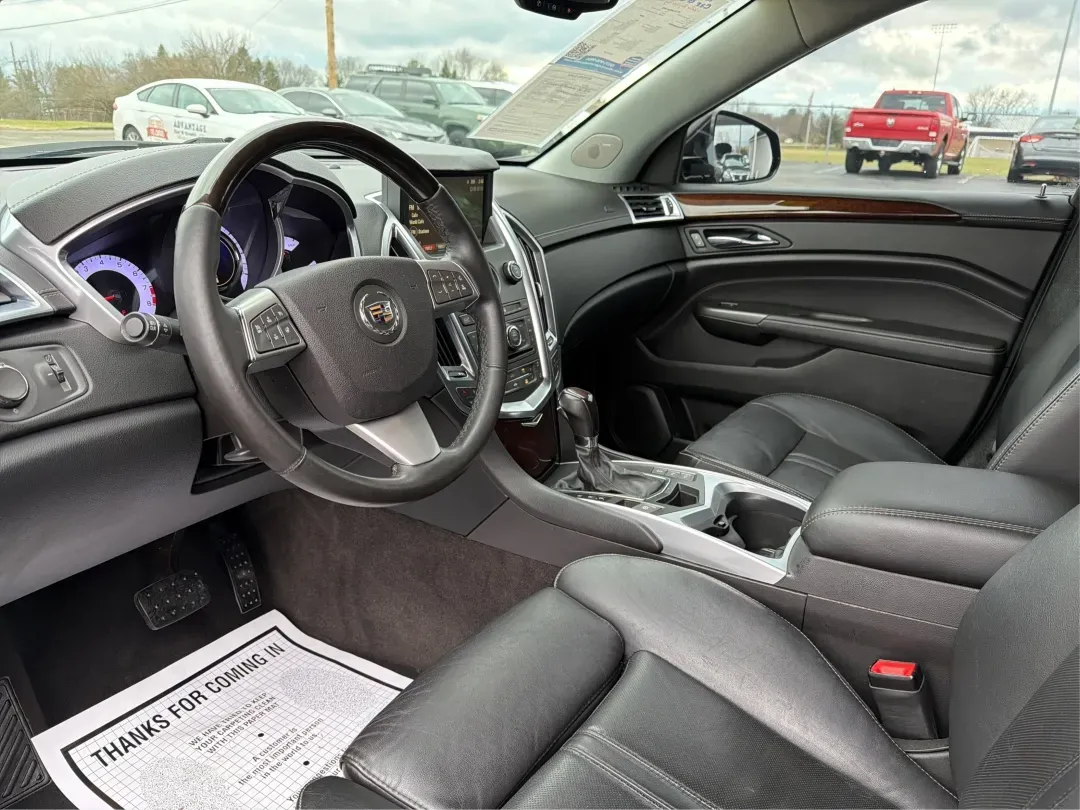 2012 Cadillac SRX Luxury Collection (3GYFNAE33CS) with an 3.6L V-6 gasoline direct injection engine, located at 401 Woodman Dr, Riverside, OH, 45431, (937) 908-9800, 39.760899, -84.123421 - **Experience the Luxury of the 2012 Cadillac SRX: Your Perfect Family SUV Awaits!**<br /> <br /> Are you in search of a vehicle that seamlessly marries style, comfort, and practicality? Whether you're looking for a family-friendly SUV for school drop-offs, a reliable companion for long commutes, or - Photo#9