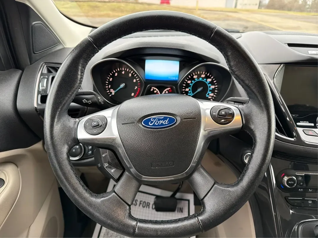 2015 Ford Escape Titanium (1FMCU0J92FU) with an Other engine, located at 880 E. National Road, Vandalia, OH, 45377, (937) 908-9800, 39.891918, -84.183594 - **Adventure Awaits with the 2015 Ford Escape Titanium Your Ideal SUV for Every Journey!**<br /> <br /> Are you looking for the perfect vehicle to accommodate family outings, weekend adventures, or long commutes? The 2015 Ford Escape Titanium, available now at Advantage Car and Credit in Vandalia, O - Photo#16