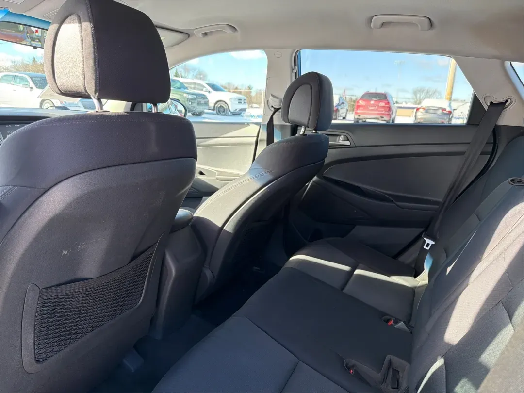 2018 Hyundai Tucson SEL (KM8J3CA43JU) with an Nu 2L I-4 gasoline direct injection engine, located at 8750 N County Rd 25A, Piqua, OH, 45356, (937) 908-9800, 40.164391, -84.232513 - Are you ready to elevate your adventures? Whether you're a growing family in need of a reliable SUV or a commuter looking for comfort on long drives, this 2018 Hyundai Tucson SEL is your ticket to a life filled with experiences. Discover the perfect blend of performance, safety, and technology at Ad - Photo#10