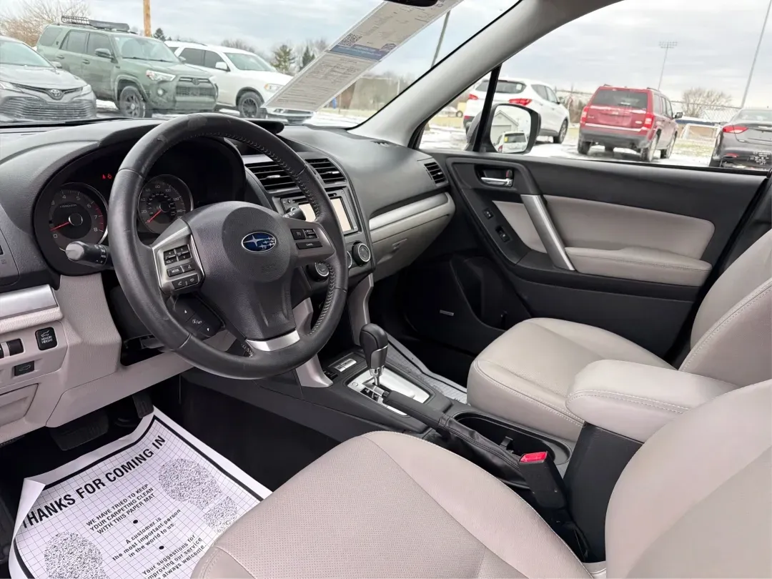 2015 Subaru Forester 2.5i Limited (JF2SJAKC0FH) with an 2.5L H-4 DOHC engine, located at 1184 Kauffman Ave, Fairborn, OH, 45324, (937) 908-9800, 39.807072, -84.030914 - Unleash your adventures with the 2015 Subaru Forester 2.5i Limited, a versatile SUV perfect for budget-conscious buyers seeking style, comfort, and capability. Whether you're planning weekend getaways in nearby Yellow Springs or commuting through Fairborn's bustling streets, this vehicle is designed - Photo#9