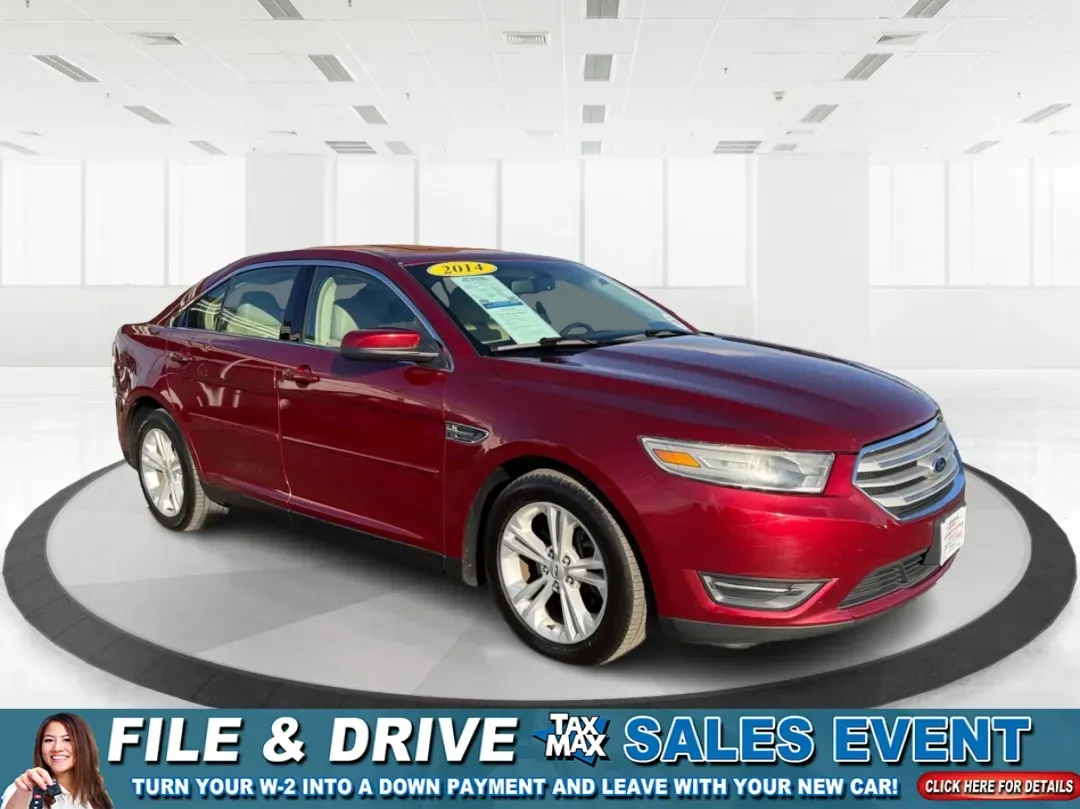 2014 Ford Taurus SEL (1FAHP2E85EG) with an EcoBoost 2L I-4 gasoline direct injection engine, located at 1230 East Main St, Xenia, OH, 45385, (937) 908-9800, 39.688026, -83.910172 - **Experience the Road Like Never Before in Your 2014 Ford Taurus SEL! Perfect for Commuters and Families Alike!**<br /> <br /> Are you ready to elevate your driving experience? The 2014 Ford Taurus SEL is not just a sedan; it's a lifestyle upgrade. Ideal for daily commuters, growing families, or any - Photo#0