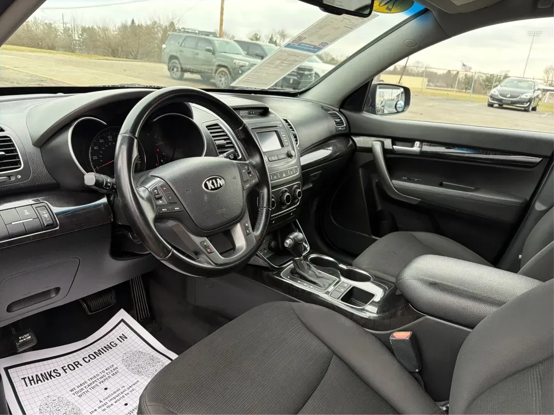2014 Kia Sorento LX (5XYKTDA63EG) with an 2.4L I-4 gasoline direct injection engine, located at 1184 Kauffman Ave, Fairborn, OH, 45324, (937) 908-9800, 39.807072, -84.030914 - ### Discover Adventure with the 2014 Kia Sorento LX at Advantage Car and Credit<br /> <br /> Are you ready to elevate your family outings, weekend adventures, or daily commutes? The 2014 Kia Sorento LX is the perfect SUV to match your dynamic lifestyle, offering practicality without sacrificing styl - Photo#9