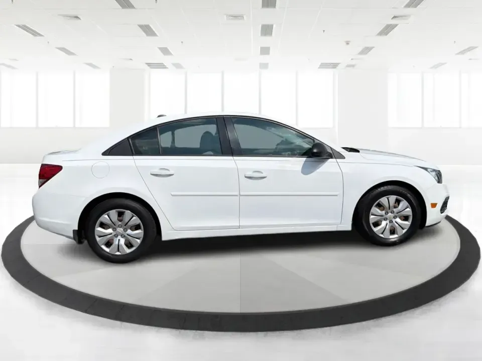 2015 Chevrolet Cruze LS Auto (1G1PA5SH8F7) with an 1.8L L4 DOHC 16V FFV engine, 6-Speed Automatic transmission, located at 8750 N County Rd 25A, Piqua, OH, 45356, (937) 908-9800, 40.164391, -84.232513 - Need a dependable commuter that keeps your weekdays simple and your weekends open? This 2015 Chevrolet Cruze LS Auto in Summit White is a smart pick for drivers who want an efficient sedan for the daily run up I75, errands around Piqua, or quick trips to Troy, Sidney, and Dayton-without giving up co- Photo#1