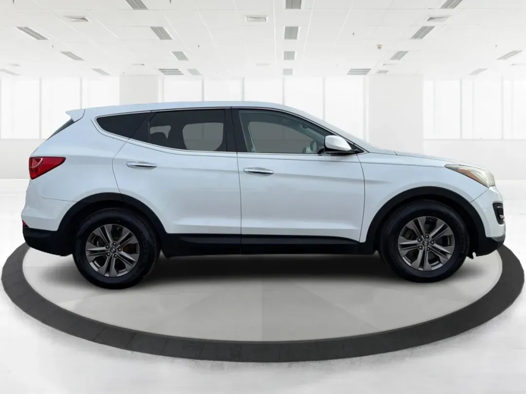 2013 Hyundai Santa Fe Sport (5XYZT3LB2DG) with an Theta II 2.4L I-4 gasoline direct injection engine, located at 1184 Kauffman Ave, Fairborn, OH, 45324, (937) 908-9800, 39.807072, -84.030914 - **Adventure Awaits: Drive the 2013 Hyundai Santa Fe Sport in Fairborn, OH!**<br /> <br /> Are you ready to elevate your lifestyle while enjoying the freedom of the open road? Look no further than the stunning 2013 Hyundai Santa Fe Sport, available now at Advantage Car and Credit in Fairborn, OH! Thi - Photo#1