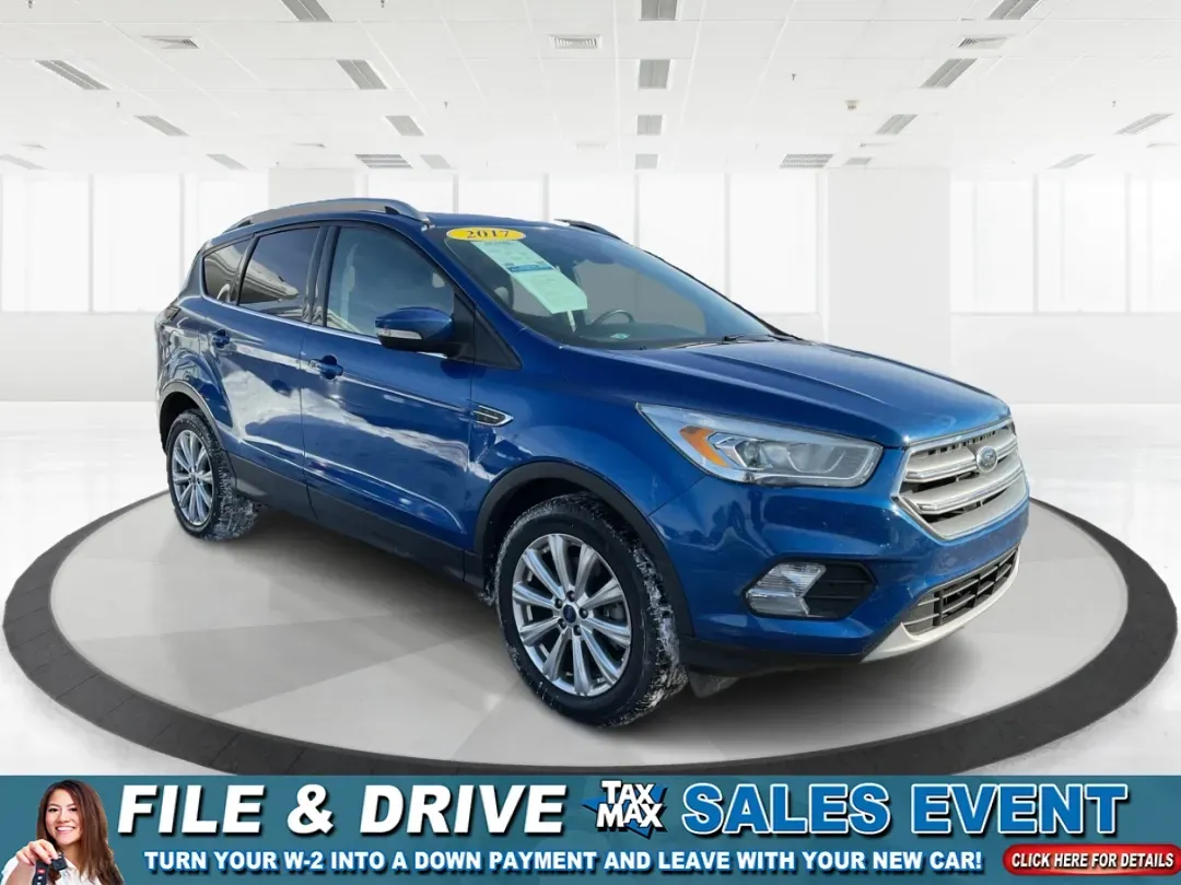 2017 Ford Escape Titanium (1FMCU0J90HU) with an Other engine, located at 4508 South Dixie Dr, Moraine, OH, 45439, (937) 908-9800, 39.689976, -84.218452 - **Adventure Awaits with the 2017 Ford Escape Titanium Perfect for Family Road Trips!**<br /> <br /> Are you ready to elevate your family adventures or daily commutes? Look no further than the 2017 Ford Escape Titanium, a sport utility vehicle designed for those who crave comfort, style, and functio - Photo#0