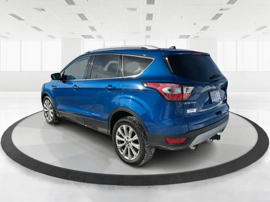 2017 Ford Escape Titanium (1FMCU0J90HU) with an Other engine, located at 4508 South Dixie Dr, Moraine, OH, 45439, (937) 908-9800, 39.689976, -84.218452 - **Adventure Awaits with the 2017 Ford Escape Titanium Perfect for Family Road Trips!**<br /> <br /> Are you ready to elevate your family adventures or daily commutes? Look no further than the 2017 Ford Escape Titanium, a sport utility vehicle designed for those who crave comfort, style, and functio - Photo#4